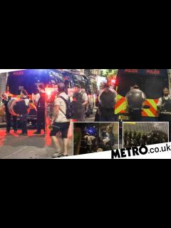 [x]Brixton: Crowd hurls rocks at police storming street after man shot ...