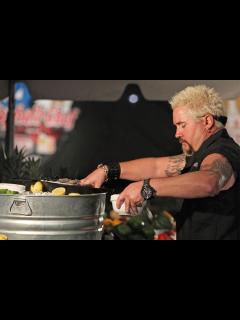 [x]Guy Fieri Reveals the Truth Behind His Hair, Sunglasses and Flame Shirt